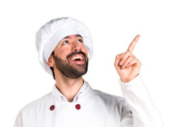 Biraz ekmek tutarak ve düşünme genç baker