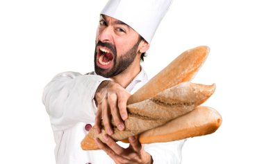 Hayal kırıklığına uğramış genç baker ekmek tutan