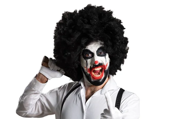 Killer-Clown mit Messer macht Horn-Geste — Stockfoto