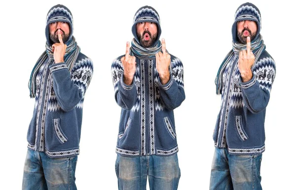 Conjunto de Hombre con ropa de invierno haciendo gesto de cuerno — Foto de Stock