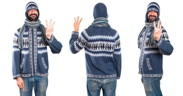 Conjunto de Homem com roupas de inverno contando três — Fotografia de Stock