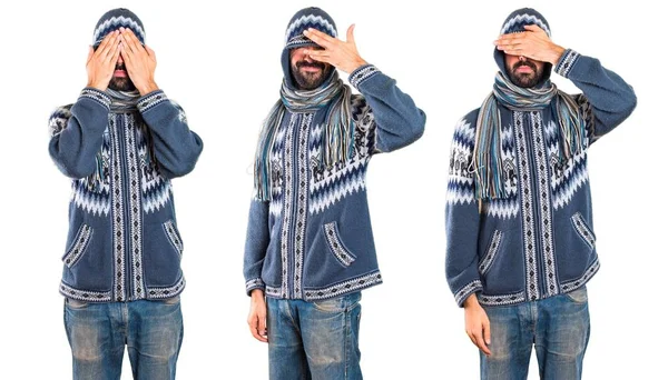 Conjunto de Hombre con ropa de invierno cubriendo sus ojos —  Fotos de Stock