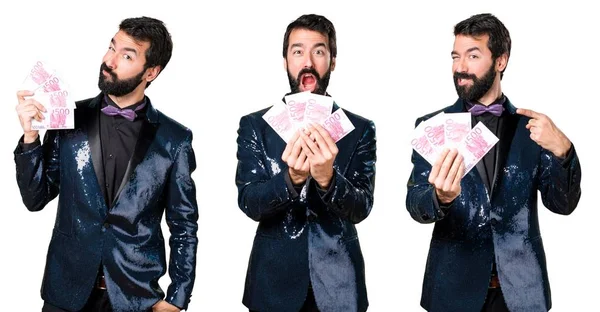 Bir sürü para alarak payet ceket ile yakışıklı adam