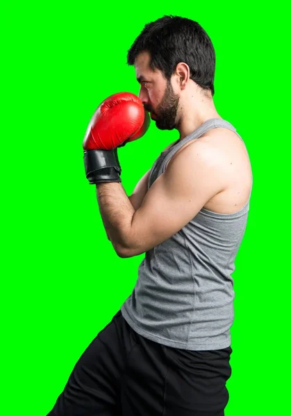 Sportivo con guanti da boxe — Foto Stock