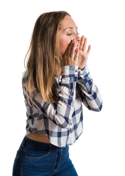 Blonde teen girl shouting on textured background — Stock Photo, Image