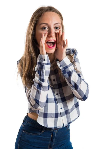 Blonde teen κορίτσι φωνάζοντας σε φόντο με υφή — Φωτογραφία Αρχείου