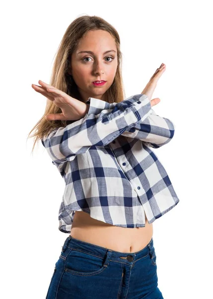 Blonde teen girl making NO gesture on textured background — Stock Photo, Image
