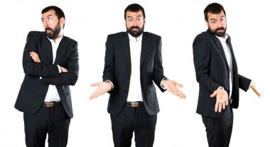 Yakışıklı işadamı önemsiz jest yapma kümesi