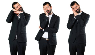 Yakışıklı işadamı uyku jest yapma kümesi