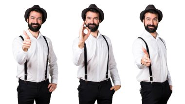 Ok işareti yapmak ve bir anlaşma sakallı hippi adam