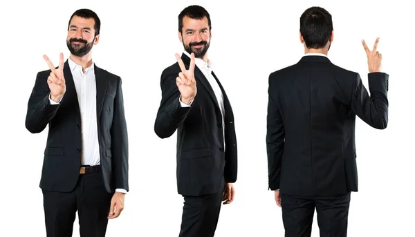 Set of Handsome businessman counting two — Stock Photo, Image