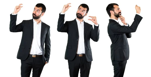 Set of Handsome businessman making tiny sign — Stock Photo, Image