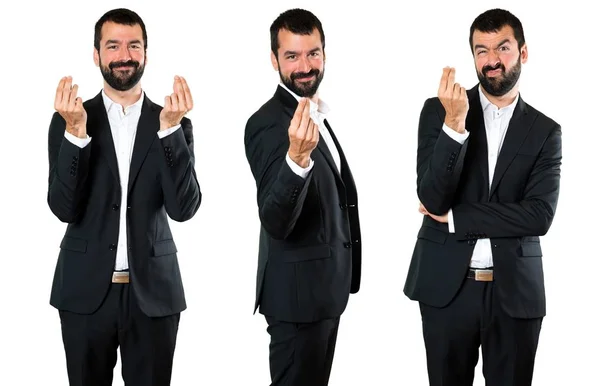 Conjunto de hombre de negocios guapo haciendo gesto de dinero —  Fotos de Stock