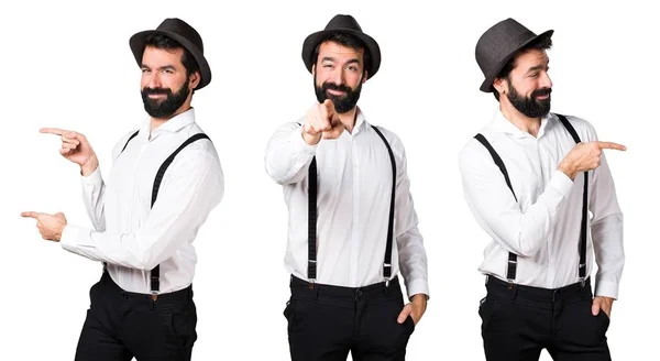 Hipster man met baard wijzen aan de voorkant en aan de laterals — Stockfoto