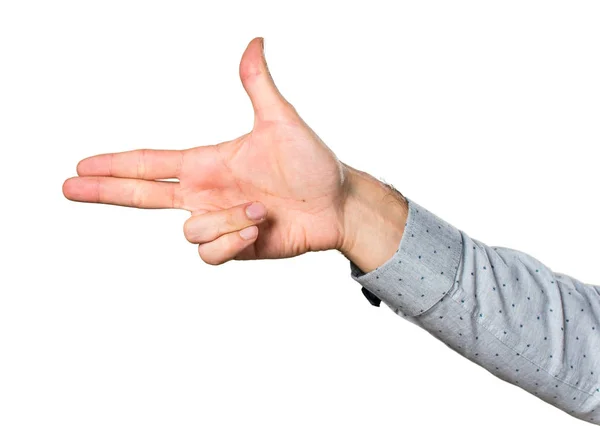 Hand of man making gun gesture — Stock Photo, Image