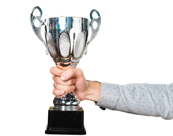Hand of man holding holding a trophy — Stock Photo, Image