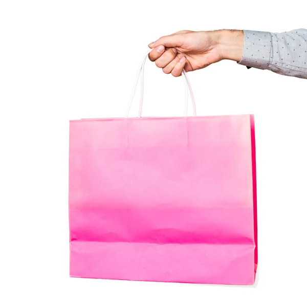 Hand of man holding a shopping bag — Stock Photo, Image