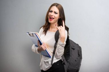 Boynuz jest yapma öğrenci kadın dokulu arka plan