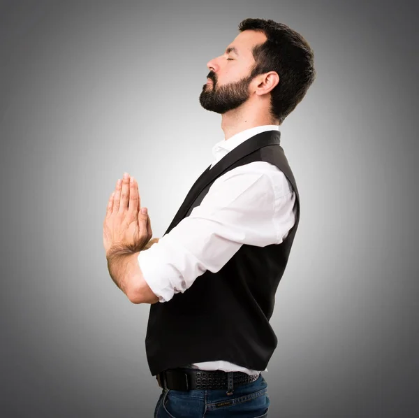 Cool man in zen position on grey background — Stock Photo, Image