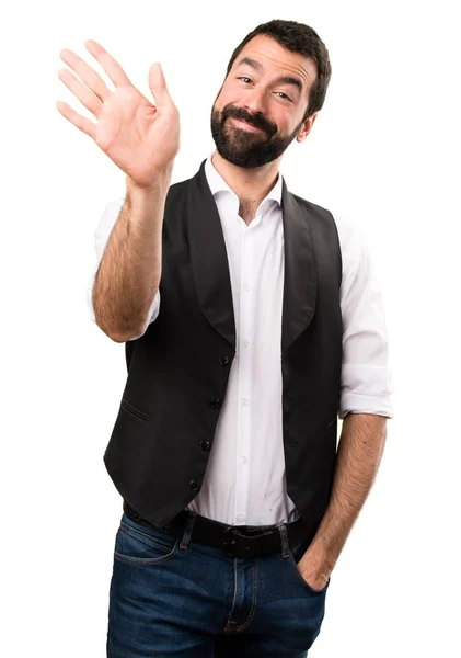 Cool man saluting on isolated white background — Stock Photo, Image