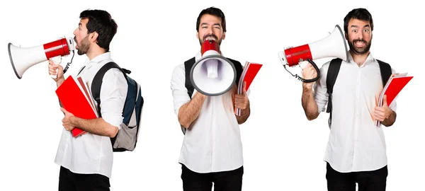 Student man shouting by megaphone — Stock Photo, Image