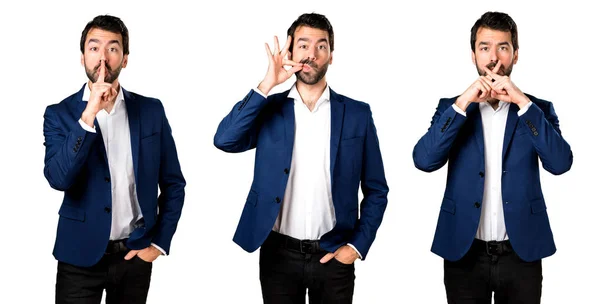 Handsome man making silence gesture — Stock Photo, Image