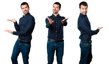 Yakışıklı adam bir şey sunmak kümesi