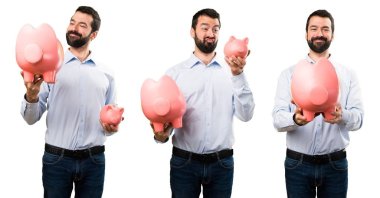 Bir servet tutan sakallı yakışıklı adam kümesi