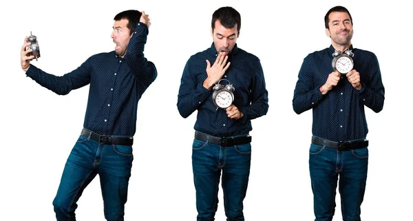 Conjunto de homem bonito segurando relógio vintage — Fotografia de Stock