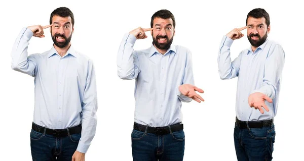 Sor jóképű férfi szakáll, hogy őrült gesztus — Stock Fotó