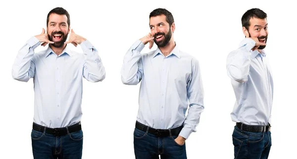 Joukko Komea mies parta tehdä puhelimen ele — kuvapankkivalokuva