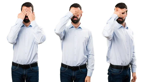 Conjunto de homem bonito com barba cobrindo seus olhos — Fotografia de Stock