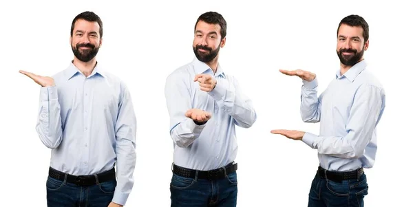 Set of Handsome man with beard holding something — Stock Photo, Image