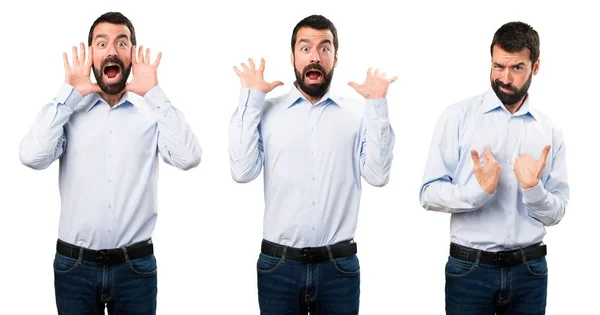 Conjunto de homem bonito com barba fazendo gesto surpresa — Fotografia de Stock