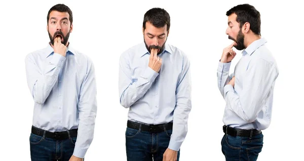 Ensemble de bel homme avec barbe faisant un geste de vomissement — Photo