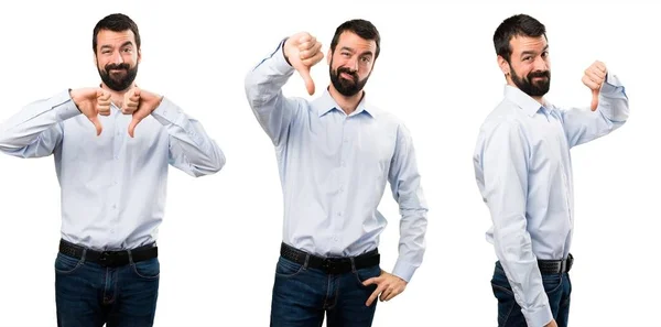 Set of Handsome man with beard making bad signal — Stock Photo, Image