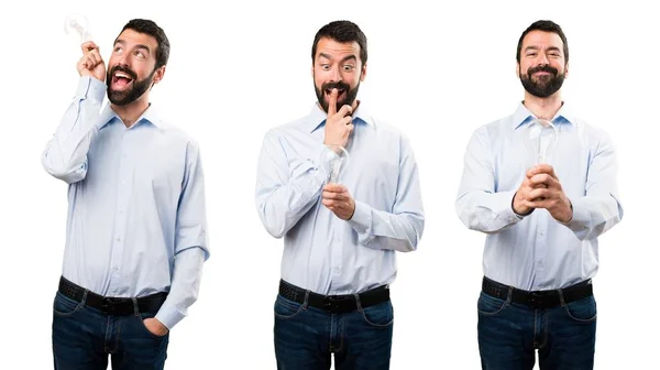 Aantal knappe man met baard een lamp te houden — Stockfoto