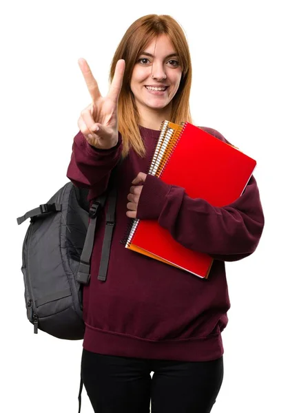 Estudante mulher contando dois — Fotografia de Stock