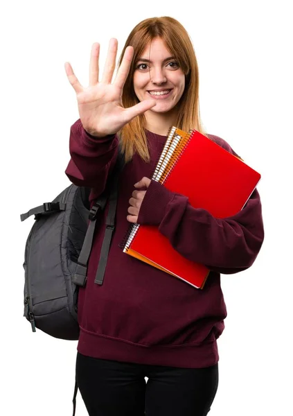 Studerande kvinna räknar fem — Stockfoto