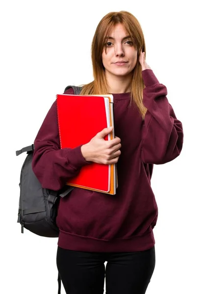 Estudante mulher cobrindo seus ouvidos — Fotografia de Stock
