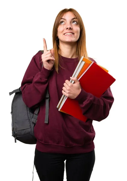 Studentin zeigt nach oben — Stockfoto