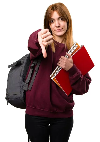 Estudante mulher fazendo mau sinal — Fotografia de Stock