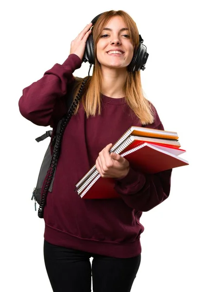 Étudiant femme écouter de la musique — Photo