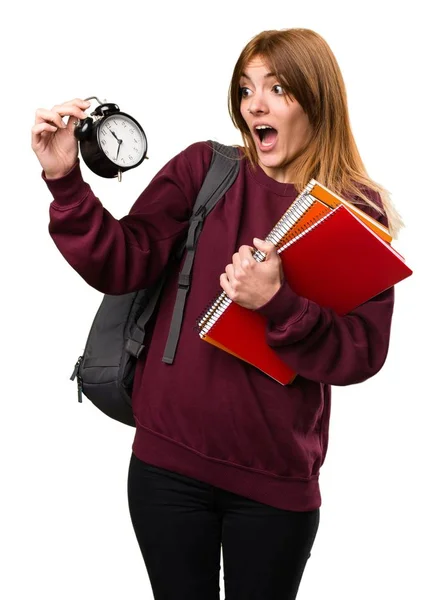 Студентська жінка тримає старовинний годинник — стокове фото