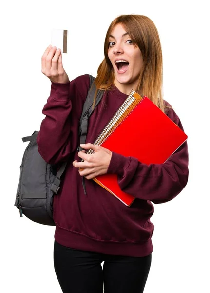 Studente donna in possesso di una carta di credito — Foto Stock