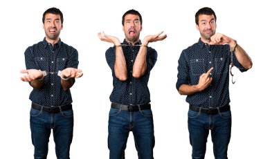 Kelepçe ile sinirli esmer adam kümesi