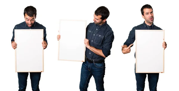 Conjunto de morena homem segurando um cartaz vazio — Fotografia de Stock