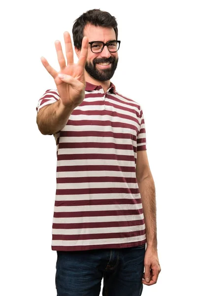 Homem com óculos contando quatro — Fotografia de Stock