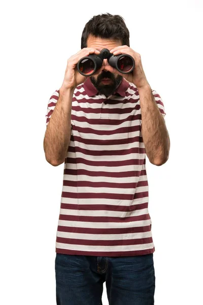 Man met bril met een verrekijker — Stockfoto