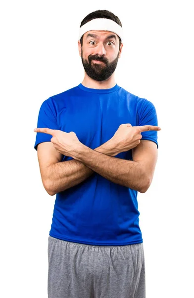 Funny sportsman pointing to the laterals having doubts on isolat — Stock Photo, Image